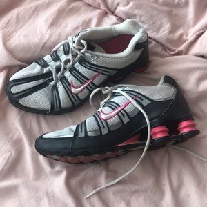 Pink and black nike shox